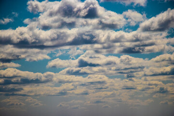 Beautiful blue sky and white cirrus clouds. Background. Texture. Scenery. Material for design.