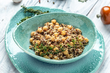 Canvas Print - bowl of quinoa salad with chickpeas and thyme. Super food, Food recipe background. Close up