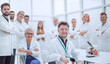© ASDF - group of doctors and scientists standing in the laboratory.