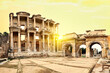 Antique library of Celsus in Ephesus under yellow sky
