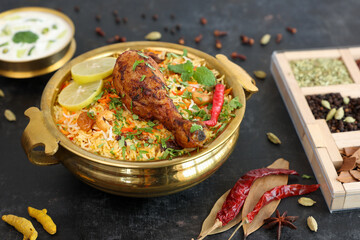 Canvas Print - Chicken biryani Spicy Indian Malabar biryani Hyderabadi biryani, Dum Biriyani pulao Kerala India Sri Lanka Pakistan basmati rice mixed rice dish with meat curry Ramadan Kareem, Eid