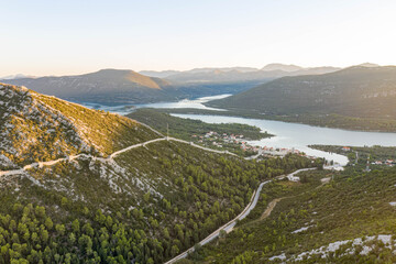 Canvas Print - Aerial drone shot of Ston city wall to Mali Ston in Ragusa region near Dubrovnik in Croatia summer sunrise