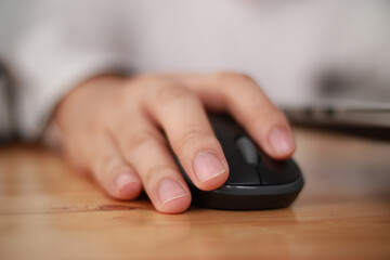 Hand using computer mouse, clicking pointer laptop pc peripheral