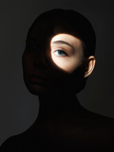 Young Woman With Shadow On The Face