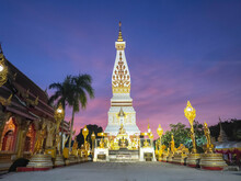 Phra That Phanom Temple With The Setting Sun, Nakon Phanom Province, Thailand.