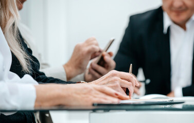 Canvas Print - close up. group of business people sitting at an office Desk