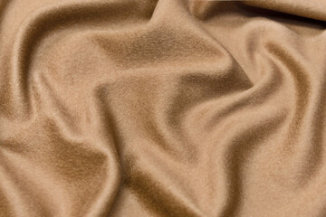 Wall Mural - The texture of cashmere fabric beige. Background, pattern.