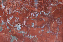 Bright Red Cracked Background. Red Plaster With Cracks. Beautiful Bright Background. Background Similar To The Surface Of Mars Planet. Cracked Brick Wall. Rusty Metal