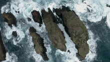 Aerial View Of The Crispy Waves Breaking On The Rocks At Sao Miguel Island, Azores Archipelagos, Portugal.