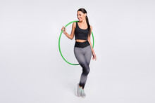 Full Length Photo Of Attractive Pretty Young Woman Hold Hula Hoop Gym Active Isolated On Grey Color Background