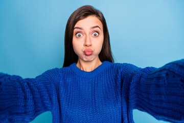 Poster - Portrait of young lovely pretty charming good looking girl pout lips taking selfie on weekend isolated on blue color background