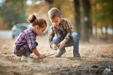 Wall Mural - Brother and sister playing outdoor