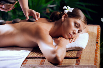 portrait of young beautiful woman in spa environment