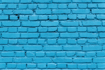 Texture of a blue brick wall of a house.