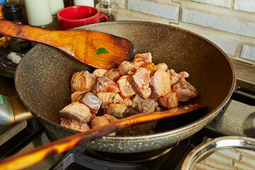 Sticker - Cooking at home in the kitchen according to recipe from the Internet. Salmon is fried in pan. Step by step recipe