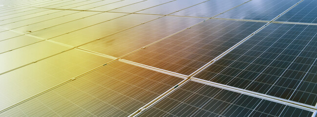 photovoltaic panels installed on the toproof of the building, sunstainable energy concept. selective
