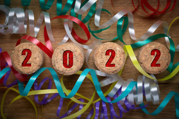 Wall Mural - 2022 new year card from champagne corks