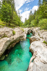 Vivid turquoise Soca river valley near Bovec in Triglav National Park, Julian Alps, Slovenia, Europe.