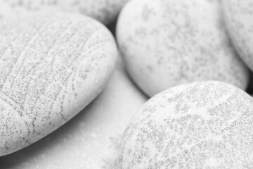 Wall Mural - Pebbles background, abstract background with dry round gray reeble stones, gray close-up pebbles background, spa relaxation concept