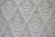 Texture of a white wall with a pattern