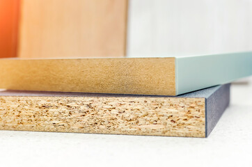 Samples laminate and laminated MDF. Slice, close-up.