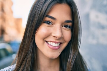 Poster - Young beautiful hispanic girl smiling happy walking at the city.