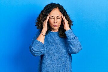 Poster - Middle age hispanic woman wearing casual clothes with hand on head for pain in head because stress. suffering migraine.