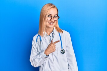 Beautiful caucasian woman wearing doctor uniform smiling cheerful pointing with hand and finger up to the side