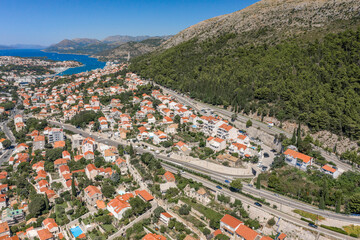 Wall Mural - Aerial drone shot of high way from Old town Dubrovnik to Lapad Peninsula in Croatia summer noon