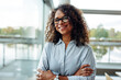 © Jacob Lund - Successful businesswoman with her arms crossed