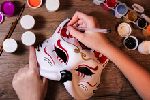 A Fox Mask Design Making By Teenage Girl. Drawing, Creativity, Hobby, Diy, Painting, Development, Education Concept. Do It Yourself Step By Step Process.