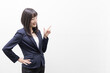© Ken Tyler - Woman standing with her index finger up  (gesture)
