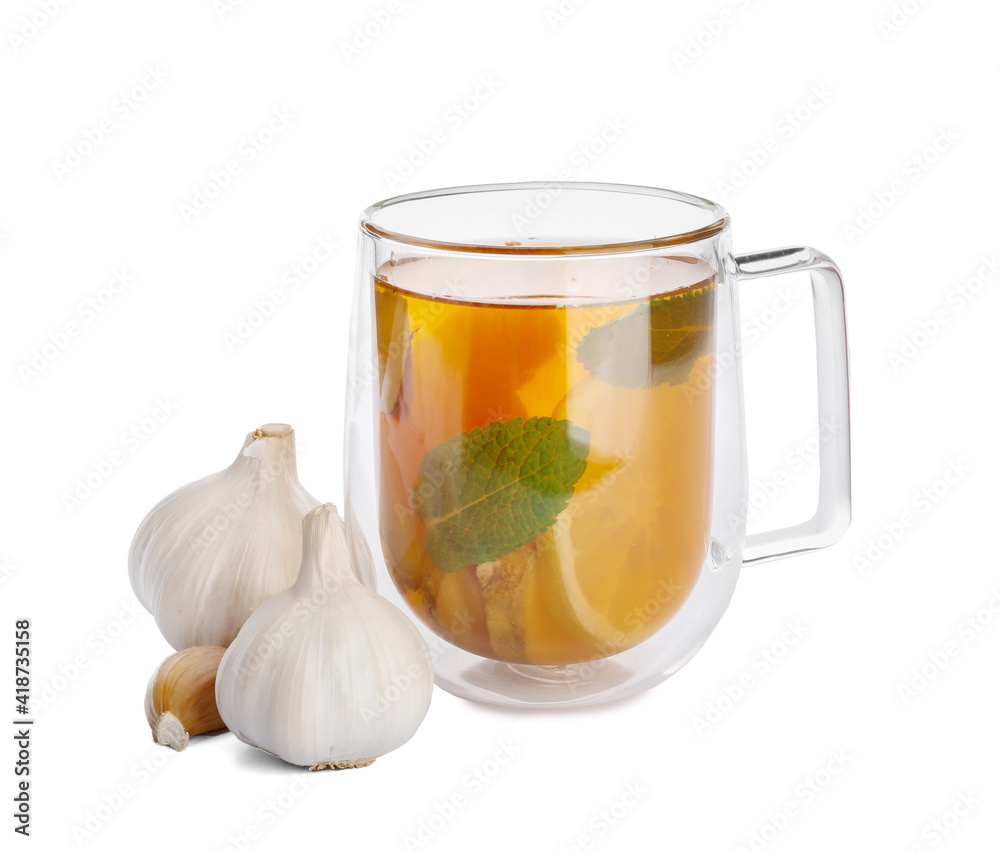Cup of healthy garlic tea on white background