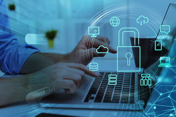 Poster - Businesswoman with laptop, desktop at office interior, blue glowing information protection icons. Padlock and business data symbols. Concept of cyber security and data storage
