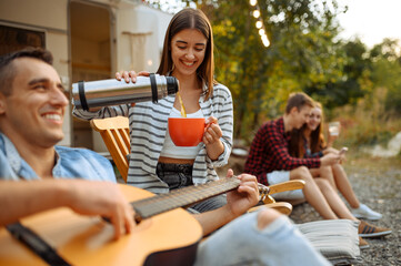 Wall Mural - friends resting on picnic, weekend at camping
