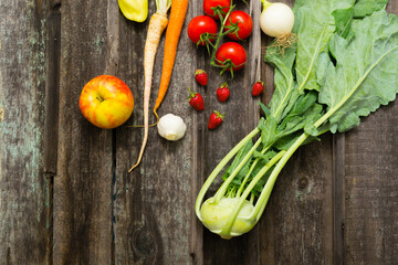 Wall Mural - fresh fruits and vegetables on weathered wooden