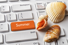 Orange Key With Summer Word And Three Seashells On A White Computer Keyboard. Summer Season Vacation By The Sea, Holidays And Travel Concepts. Keypad Enter Button With Message.