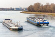 Barge boat sailing on the Rhine between Germany and France