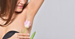 Woman armpit after depilation and tulip flower, body care and femininity concept