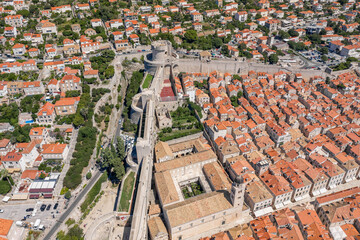 Wall Mural - Aerial drone shot of City wall Fort Minceta in Dubrovnik old town in Croatia summer noon