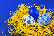 Easter Eggs On A Blue Background