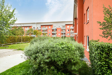 Wall Mural - Cityscape of a residential area with modern apartment buildings, new green urban landscape in the city