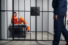 A Male Warden Guards Cells With Dangerous Criminals In A High-security Prison. Dangerous Profession