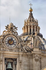 Canvas Print - Clock on facade of Saint Peter basilica in Rome, Italy