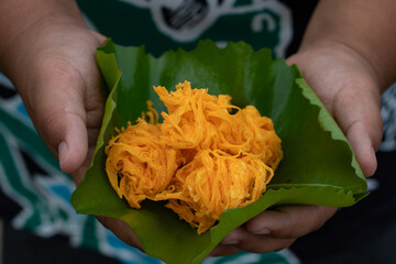 Sweet egg floss dry sweet egg floss desert  traditional dessert in thai name of Foi Thong