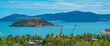 Beauty PANORAMA view. Construction site modern residential district, hotel resort. High tower cranes. Clouds sky, cyan sea, island background, palm forest front view. Real estate invest business