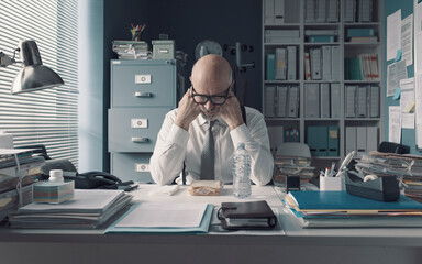 Wall Mural - Sad desk lunch in the office