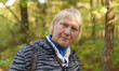 © Vladimir Arndt - Portrait of a beautiful middle-aged woman in the park.