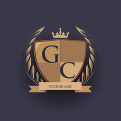 initial letter GC logotype colored brown and gold isolated with shield, crown and laurel design, logo for college and sport club.