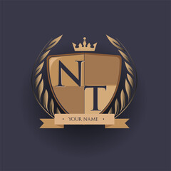 initial letter NT logotype colored brown and gold isolated with shield, crown and laurel design, logo for college and sport club.